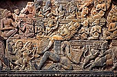 Banteay Srei temple - Shiva on Mount Kailasa (southern library east pediment) Uma sits on his lap. The ten-headed demon Ravana is shaking the mountain